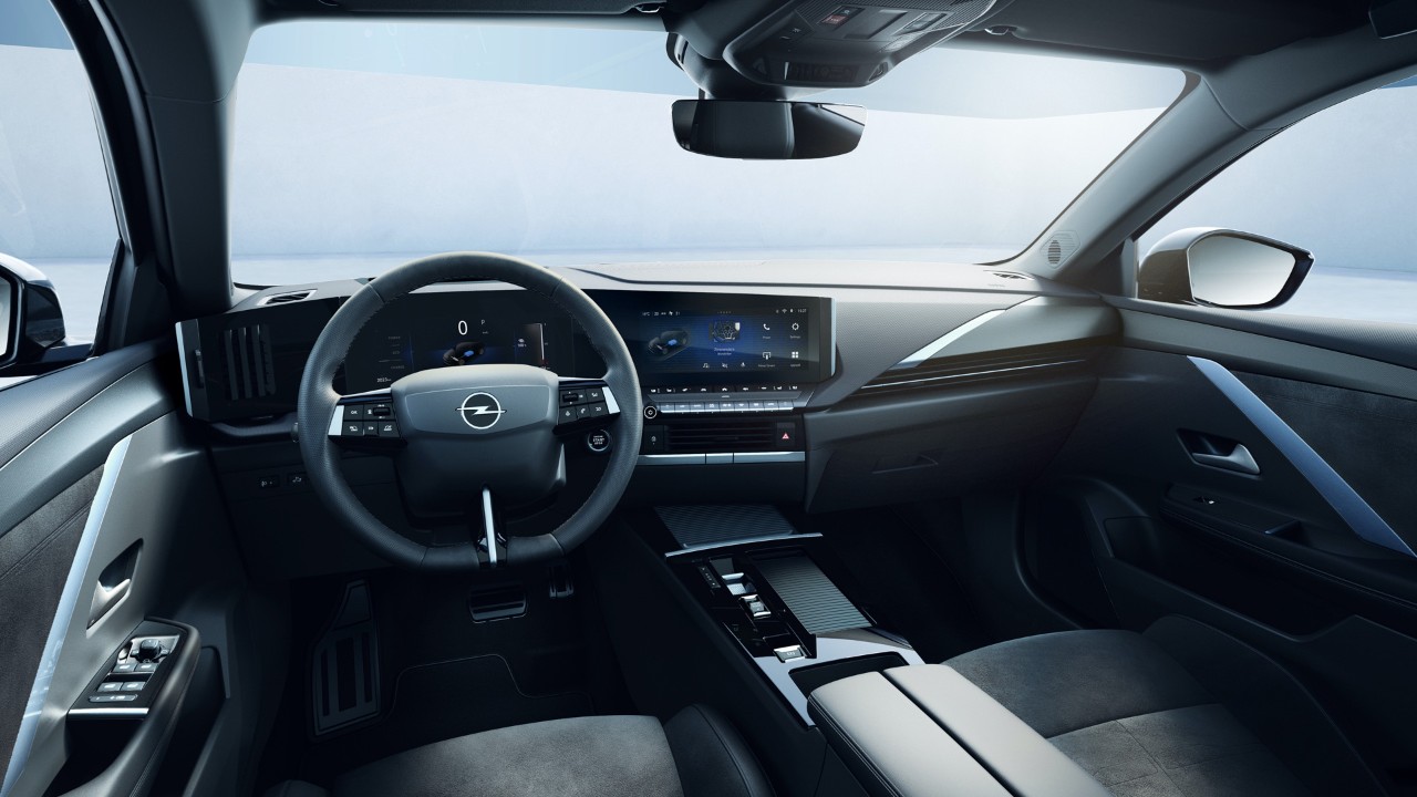 The interior of an Opel Astra Electric with driver's seat view